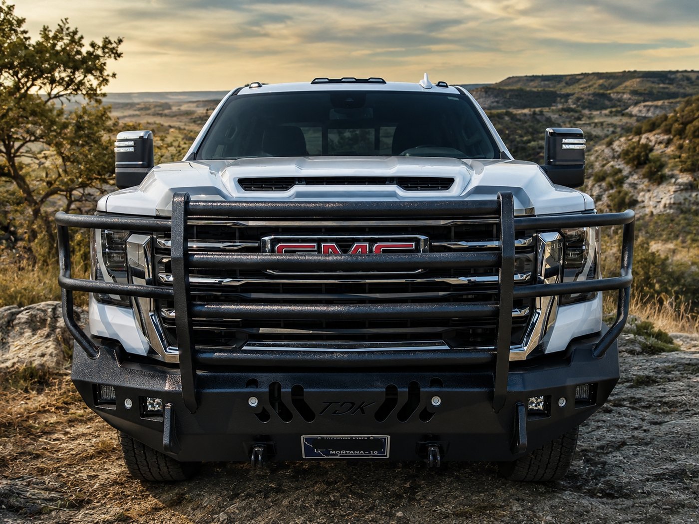 A heavy-duty grill guard on a truck on a Texas mesa